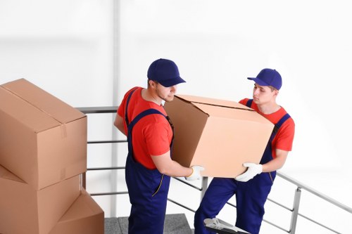 Man and van loading furniture for a local move in Enfield