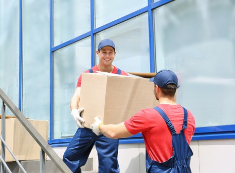 Secure loading of boxes and furniture into a moving truck in Enfield