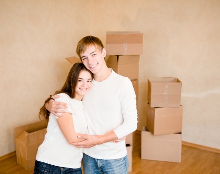 Packed boxes and wrapped belongings ready for removal in Enfield