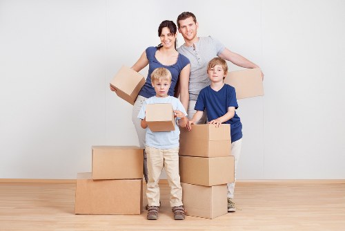 Packed boxes and furniture ready for local removals