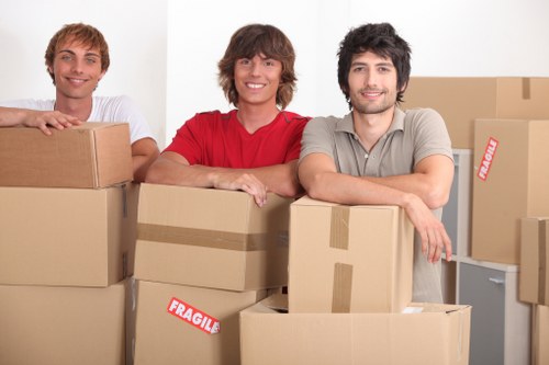 Loading furniture into a van for an Enfield house removal