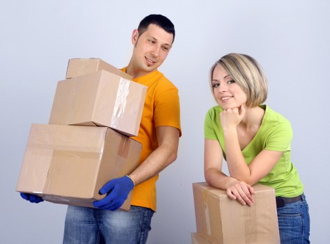 Office relocation team moving commercial equipment in Enfield