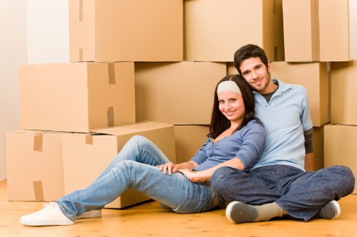 Local moving team preparing boxes and furniture for transport