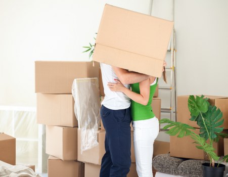 Loading furniture into a moving van in Enfield