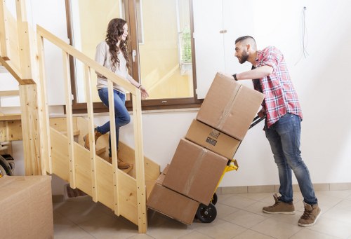 Removal team handling belongings during a house move