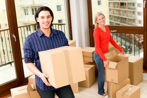 Commercial movers transporting office items in Enfield